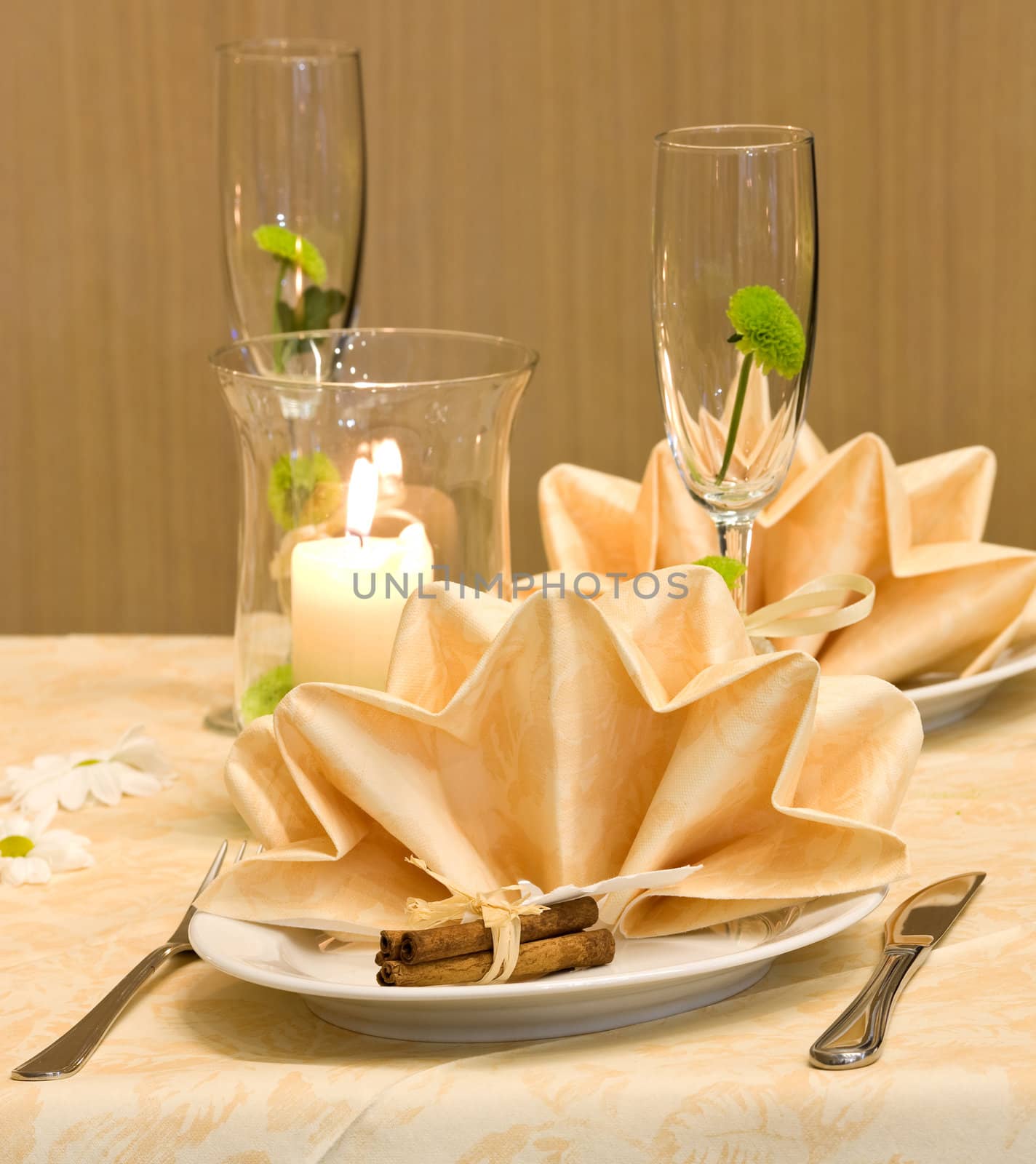 Wedding table decorated with flower and candles