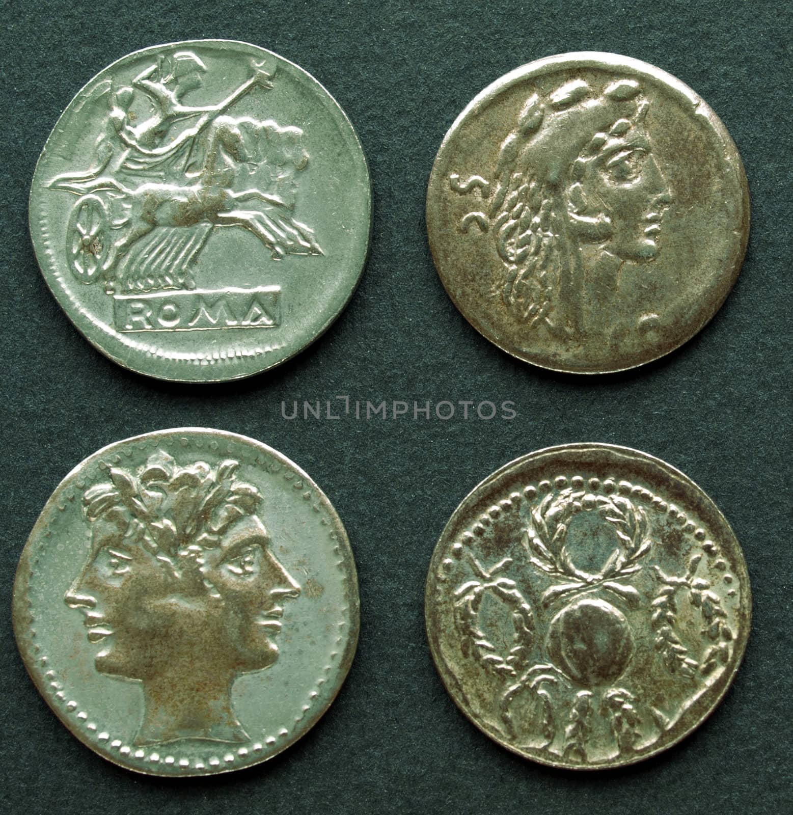 Ancient Roman coin on a black background