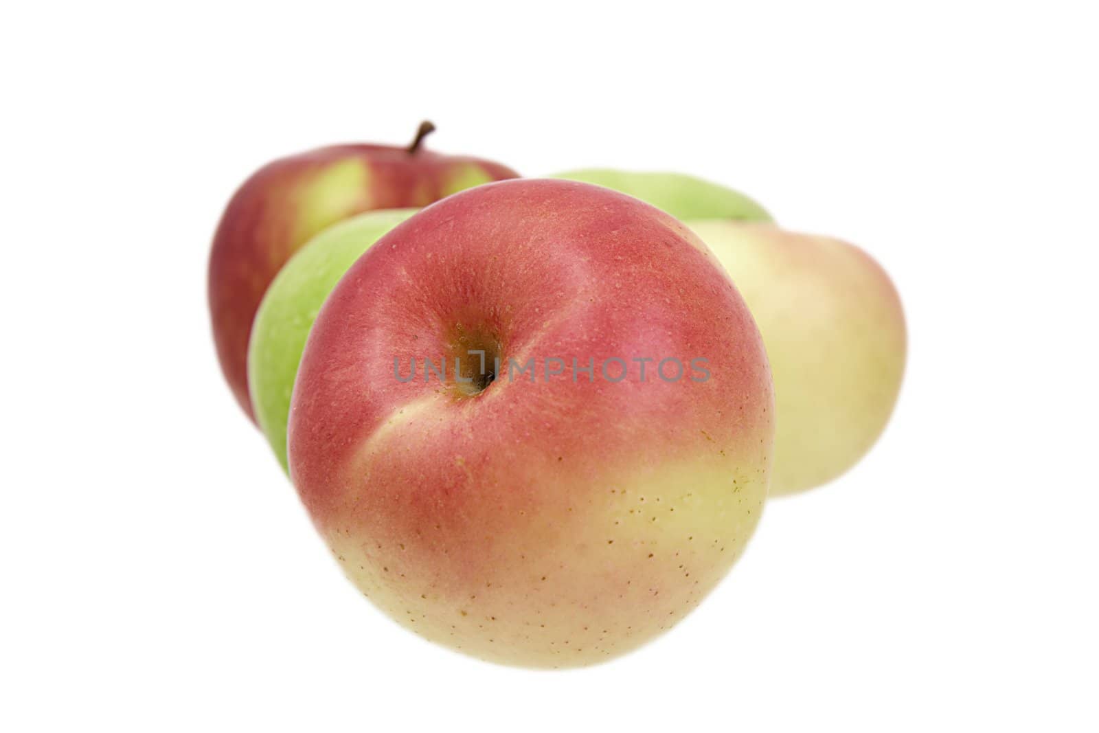 Green and red apples on a white background