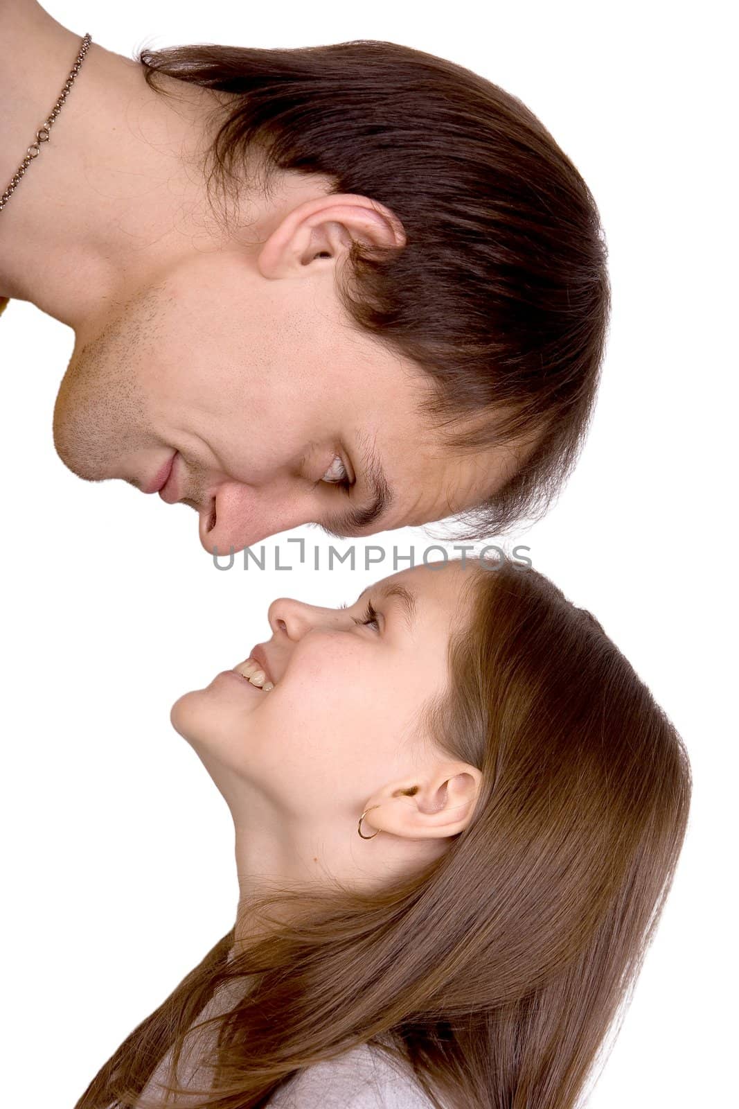 The man looks down on the girl on a white background