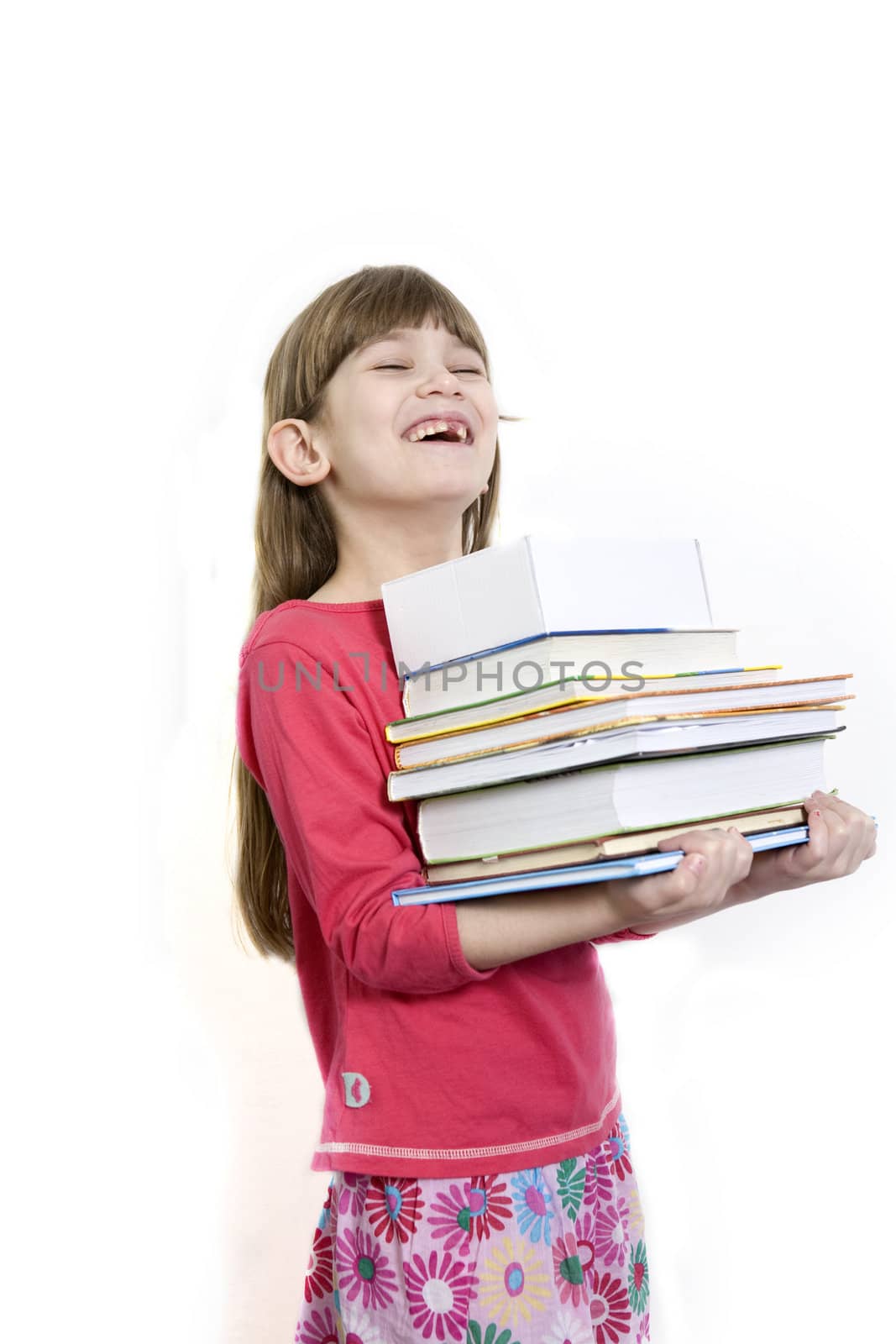 little cute girl seven years old carry books.  by elenarostunova