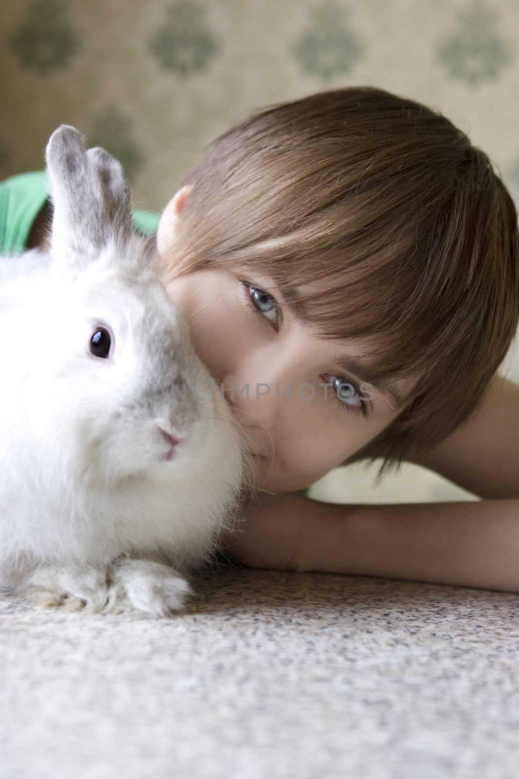 Young smiling adorable woman with rabbit