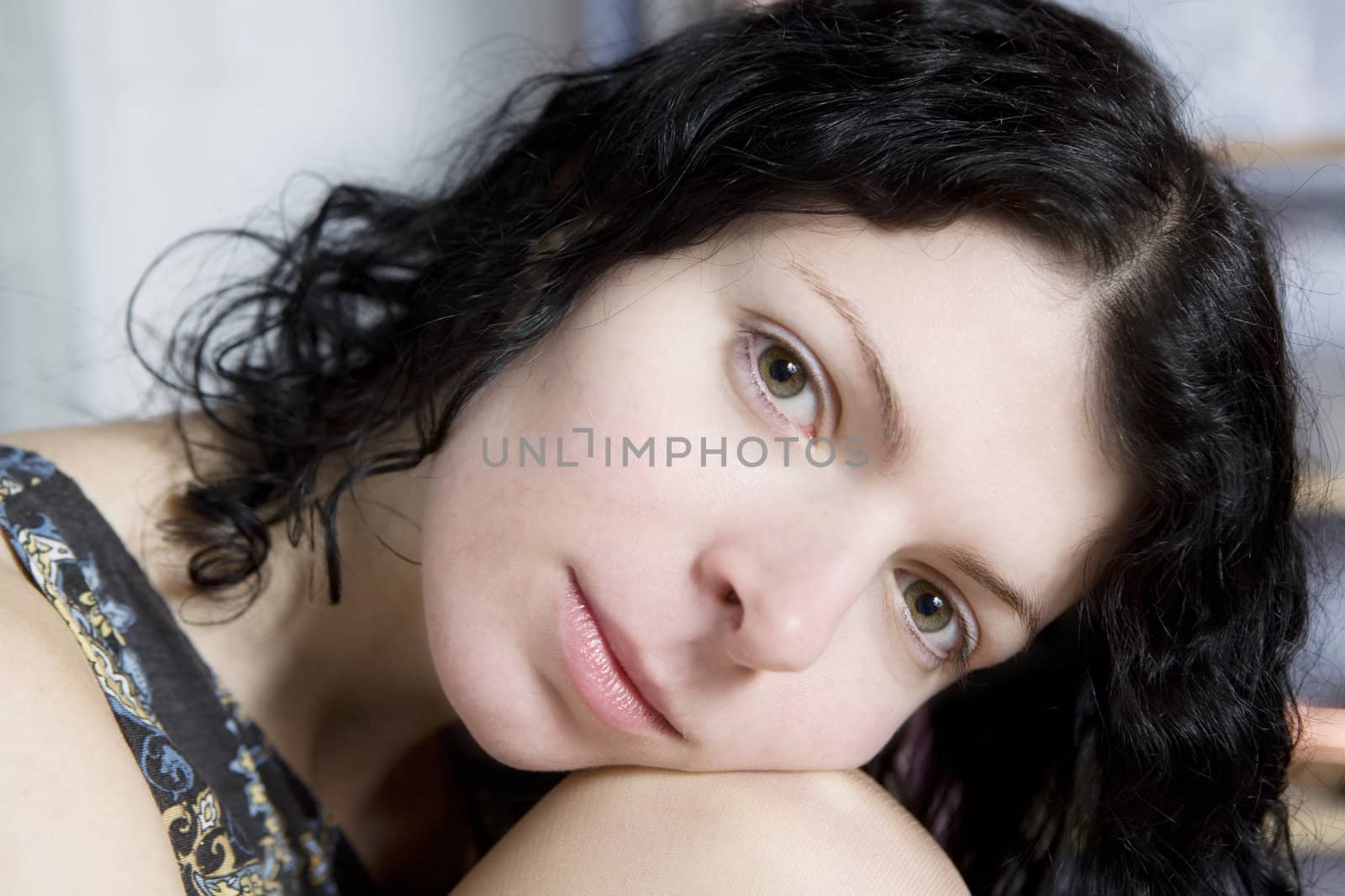portrait curl attractive young brunette woman looking at camera
