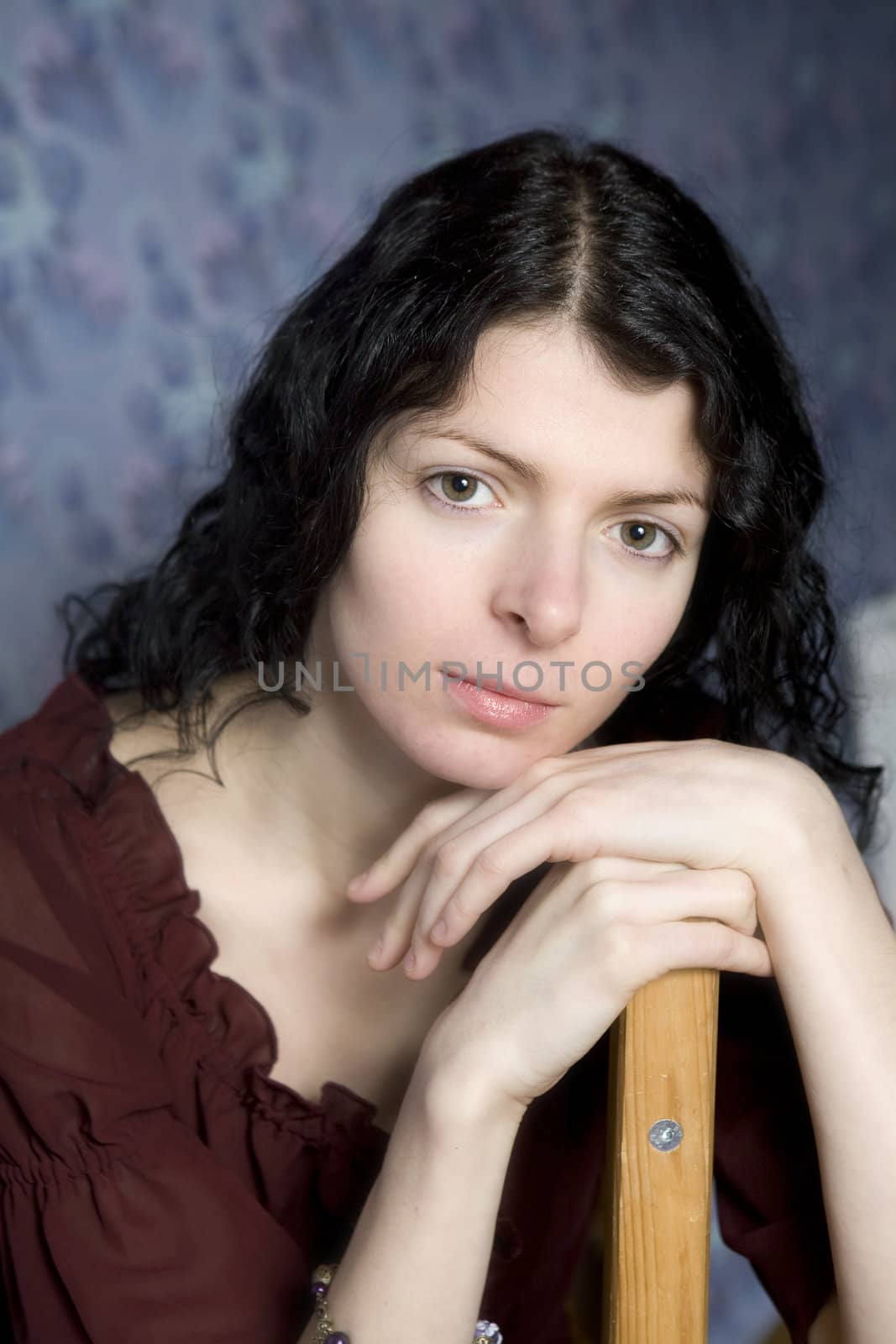 portrait of young serious woman by elenarostunova