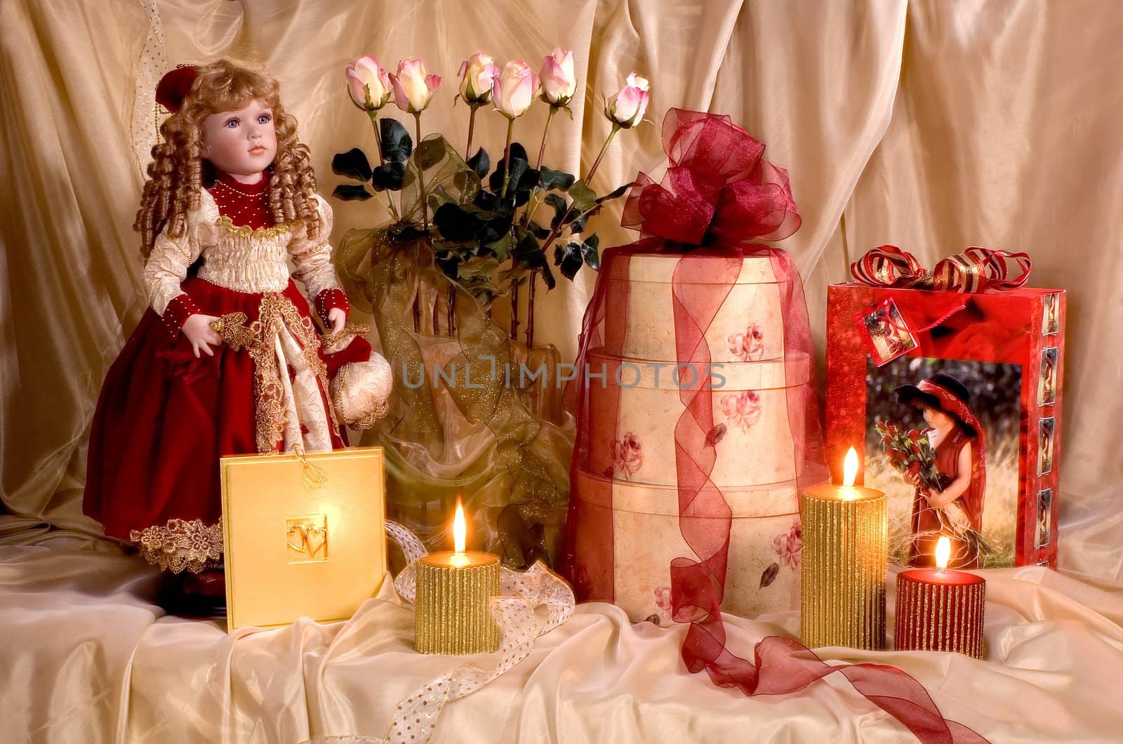 Still-life with gifts, a doll and a bouquet of roses