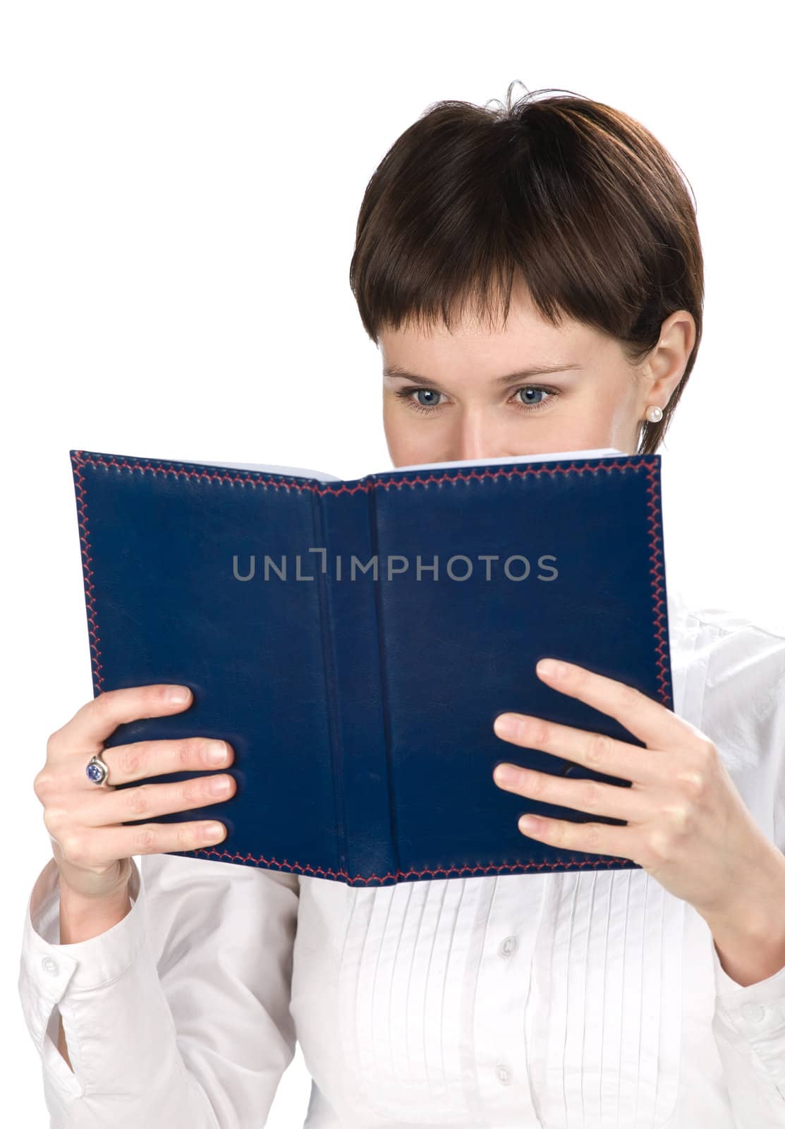 Portrait of young woman with book on white background