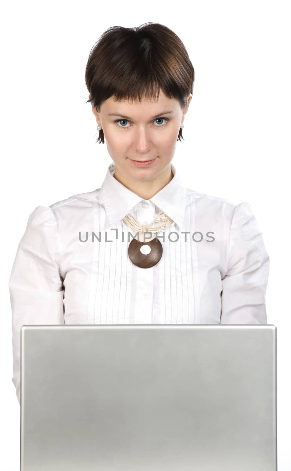 Portrait of young woman with laptop on white background