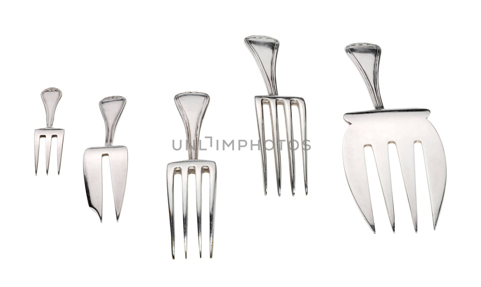 Silver forks set setout on a white background. With clipping path.