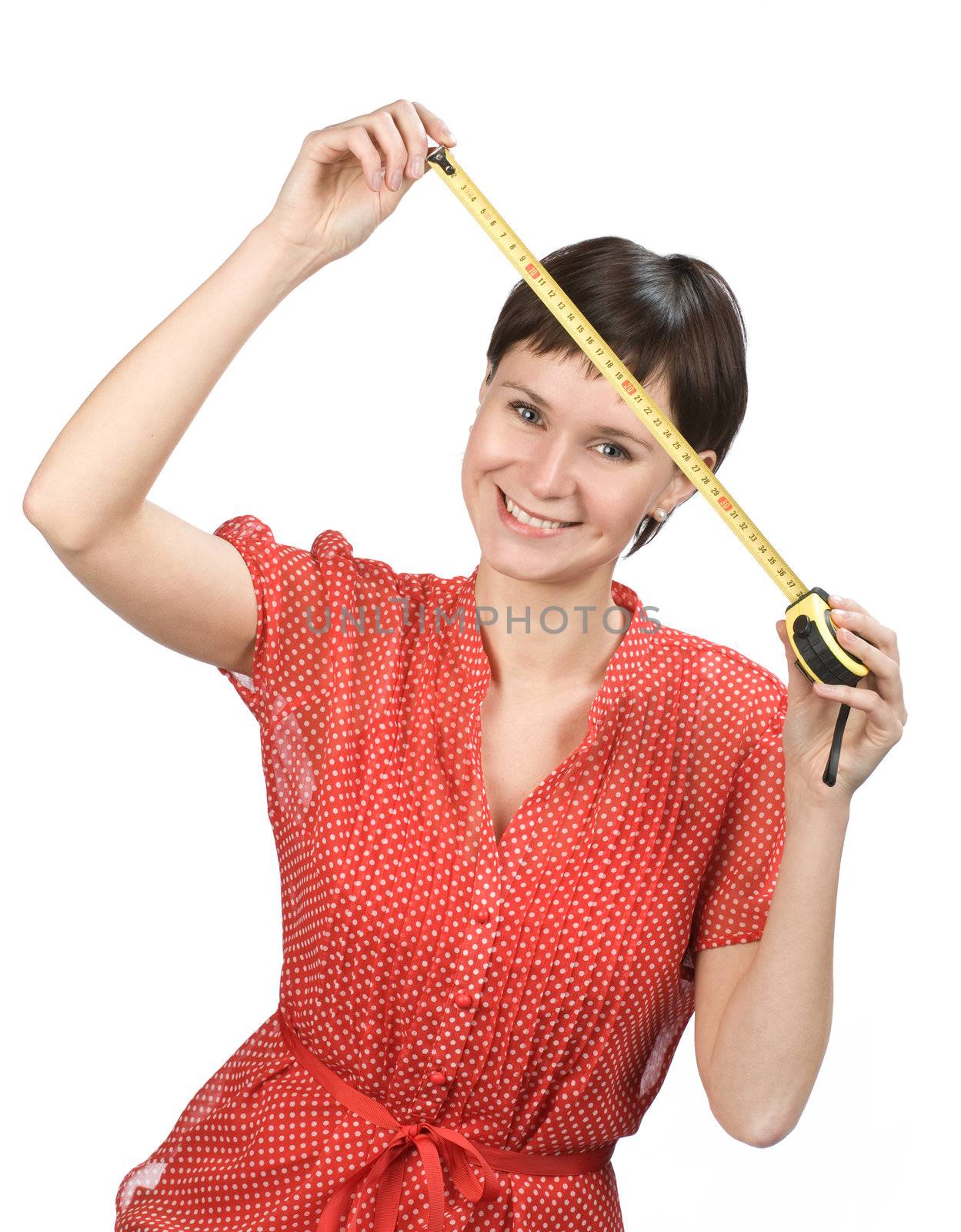 Young women with tape measure on white background