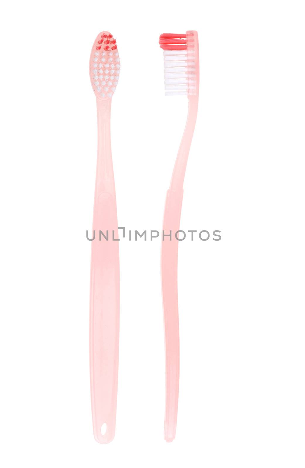 Colored toothbrush in glass. With clipping path.