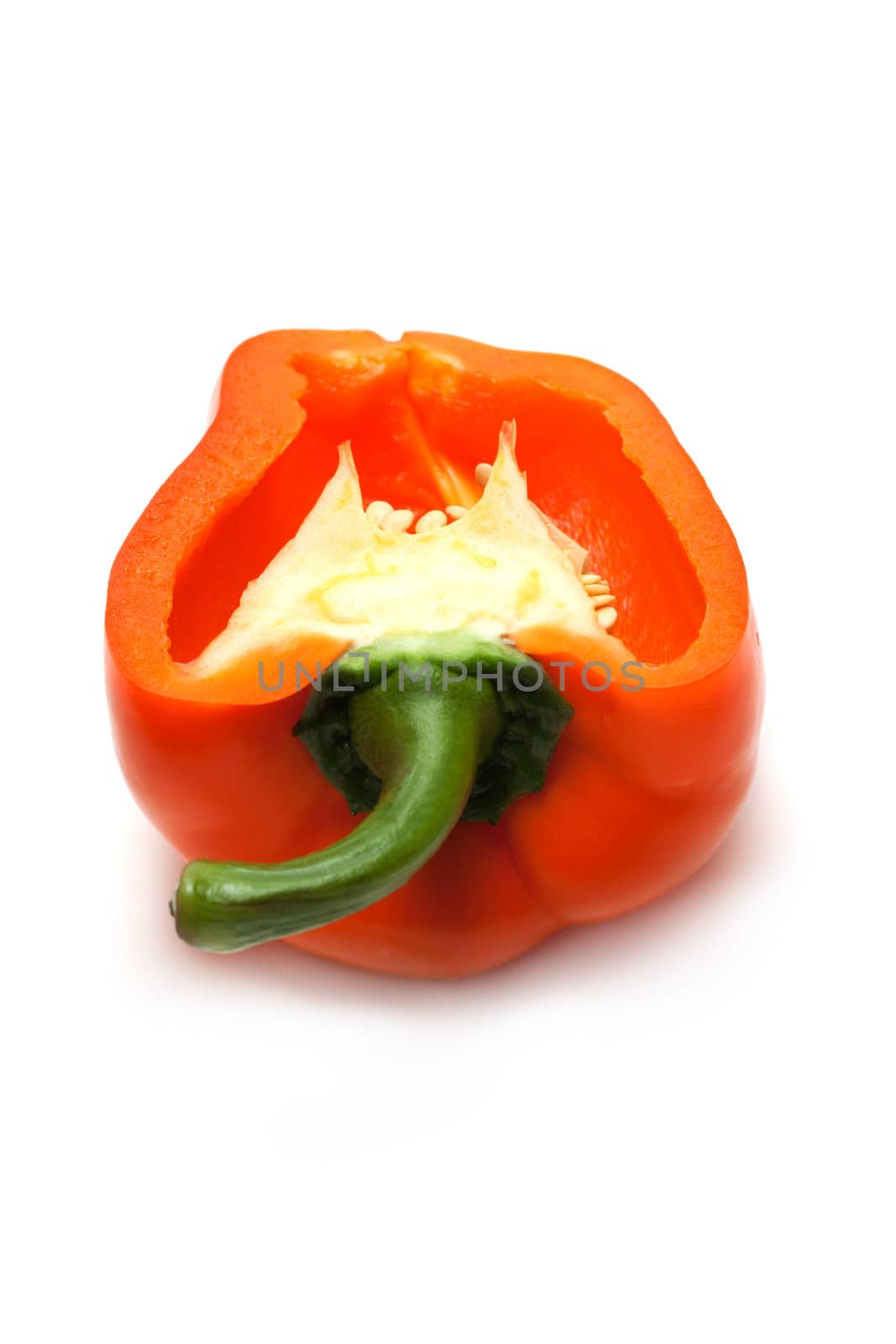 Cut fifty-fifty orange bulgarian pepper insulated on white background