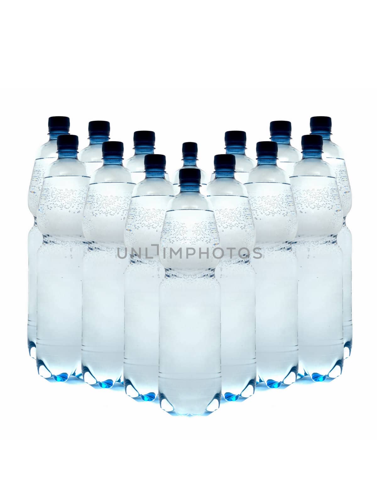 plastic bottles of mineral water, laid out in a row on a white background.