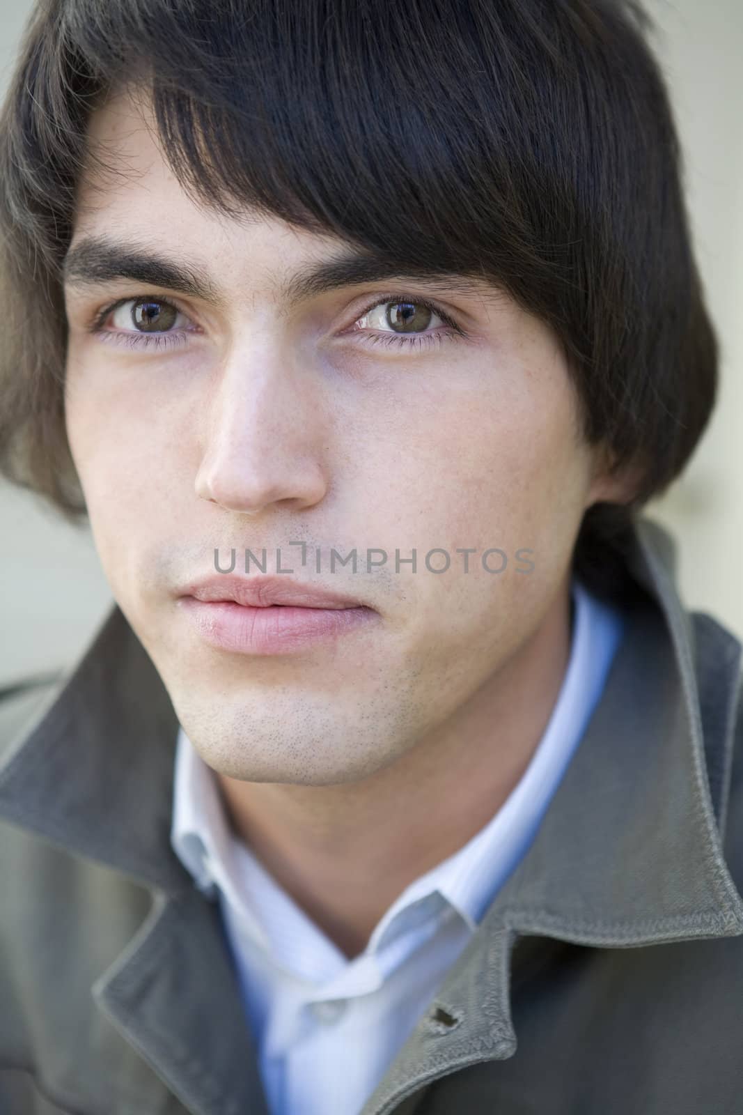 young serious handsome man by elenarostunova