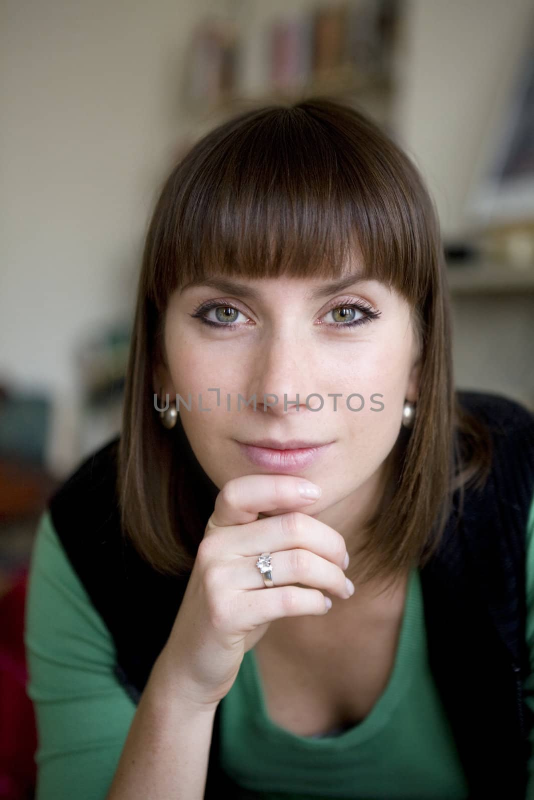 portrait attractive brunette pensive woman wearing green blouse by elenarostunova