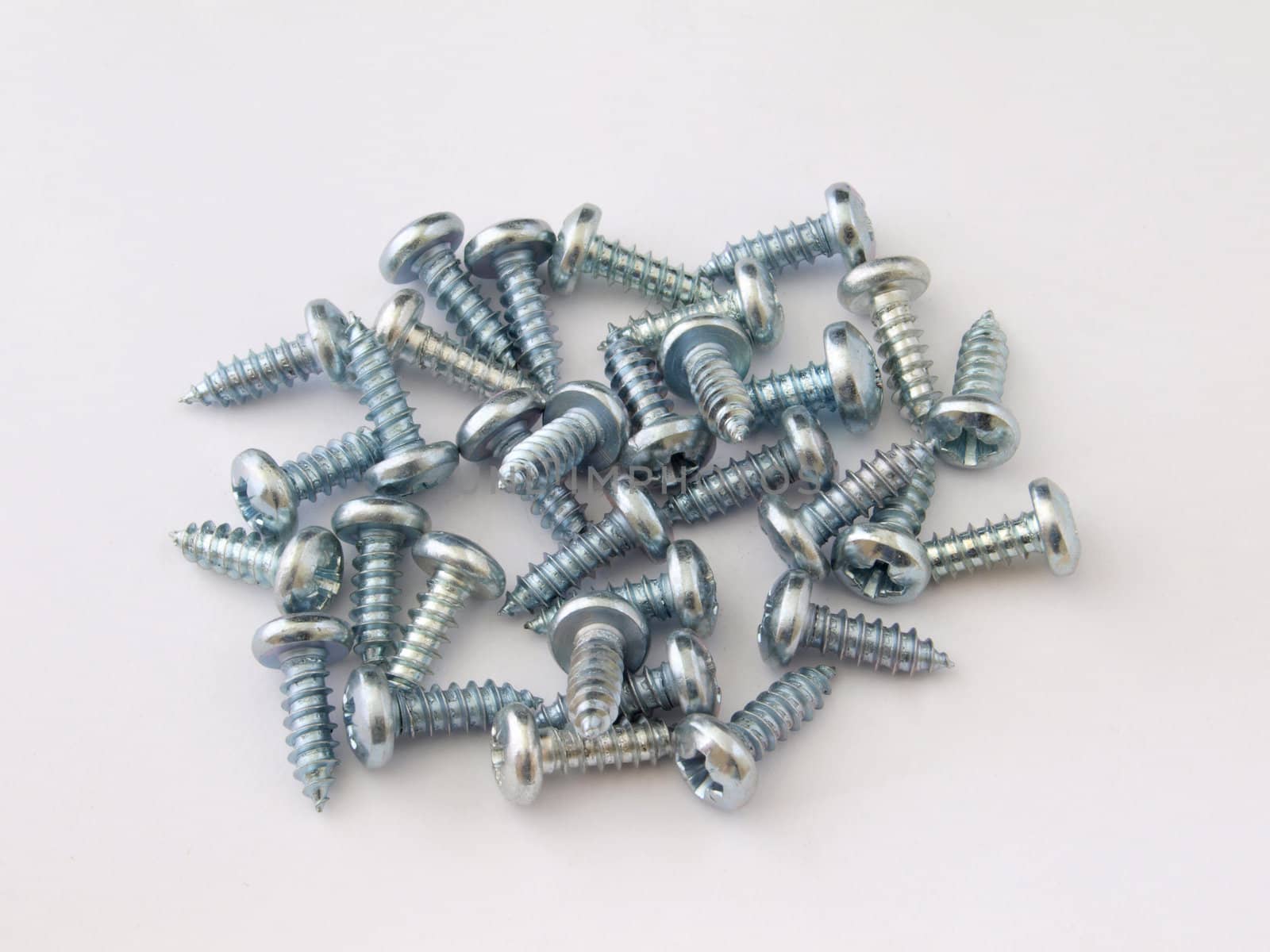 A collection of new chrome  crosshead screws.