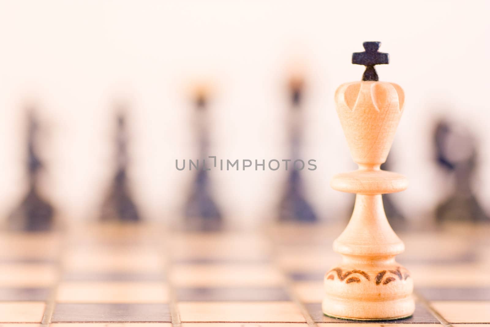 Conceptual with wood chess pieces