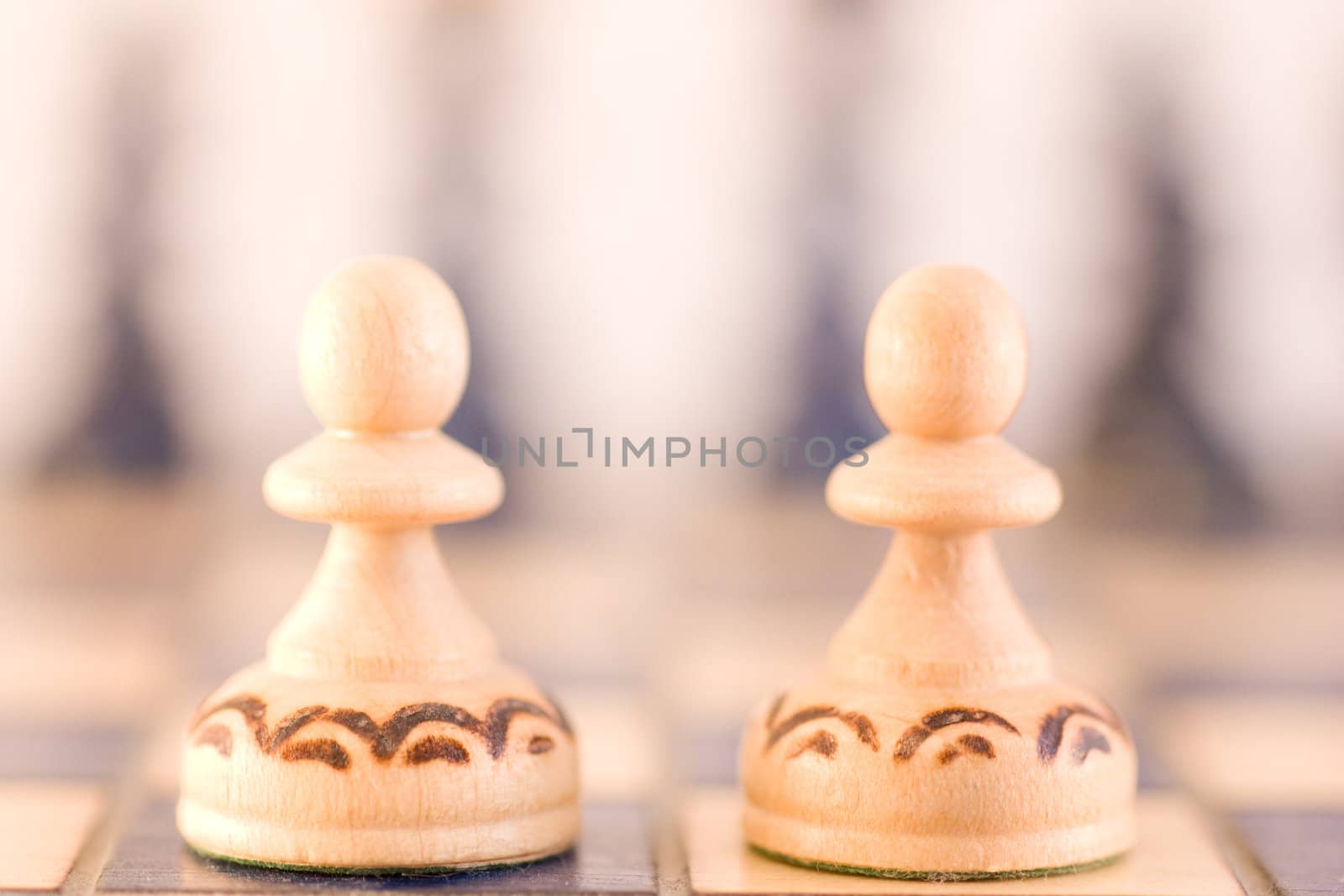 Conceptual with wood chess pieces