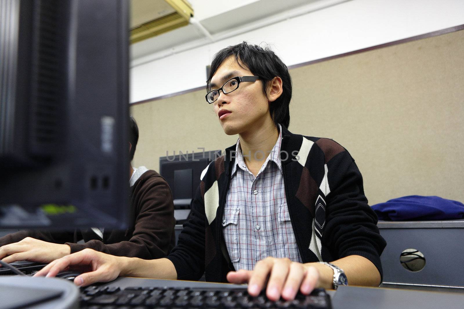 student studying in computer room