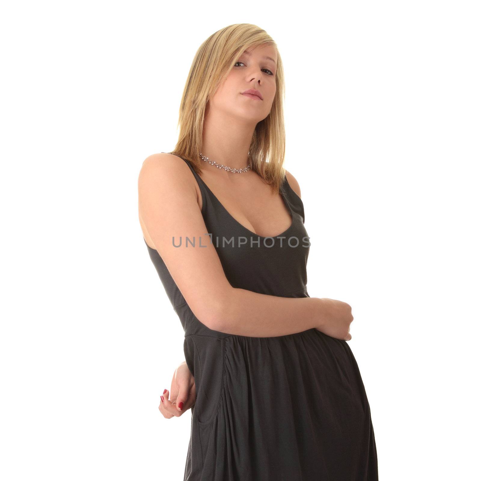 Beautiful teenager young blond girl in black elegant dress isolated on white background