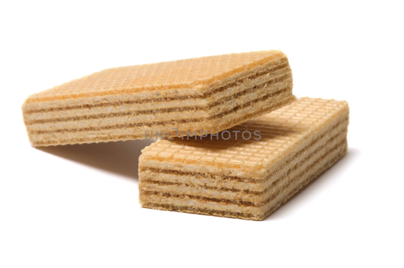 Two wafers close up it is isolated on a white background.