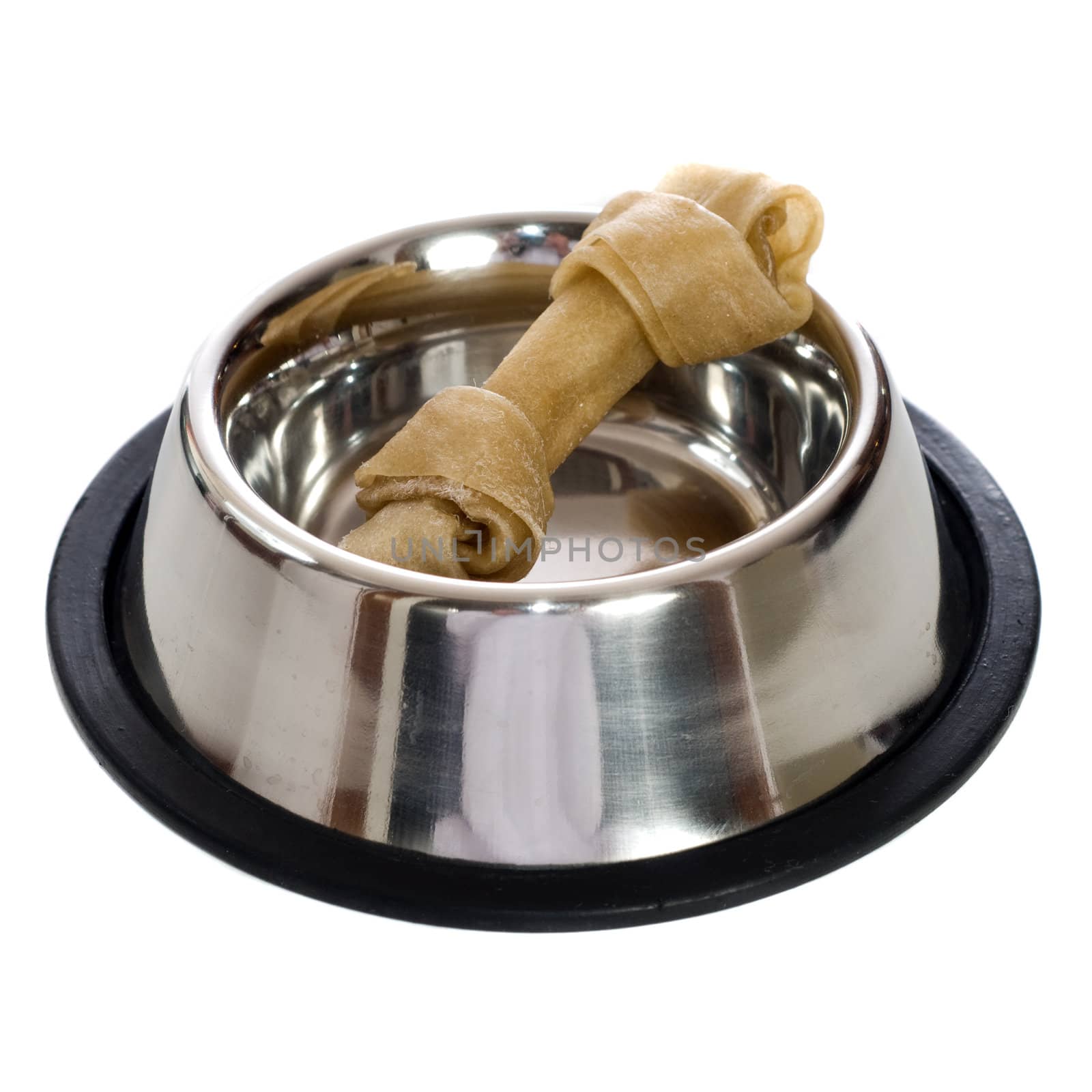 A rawhide dog bone in a metal dish, isolated against a white background