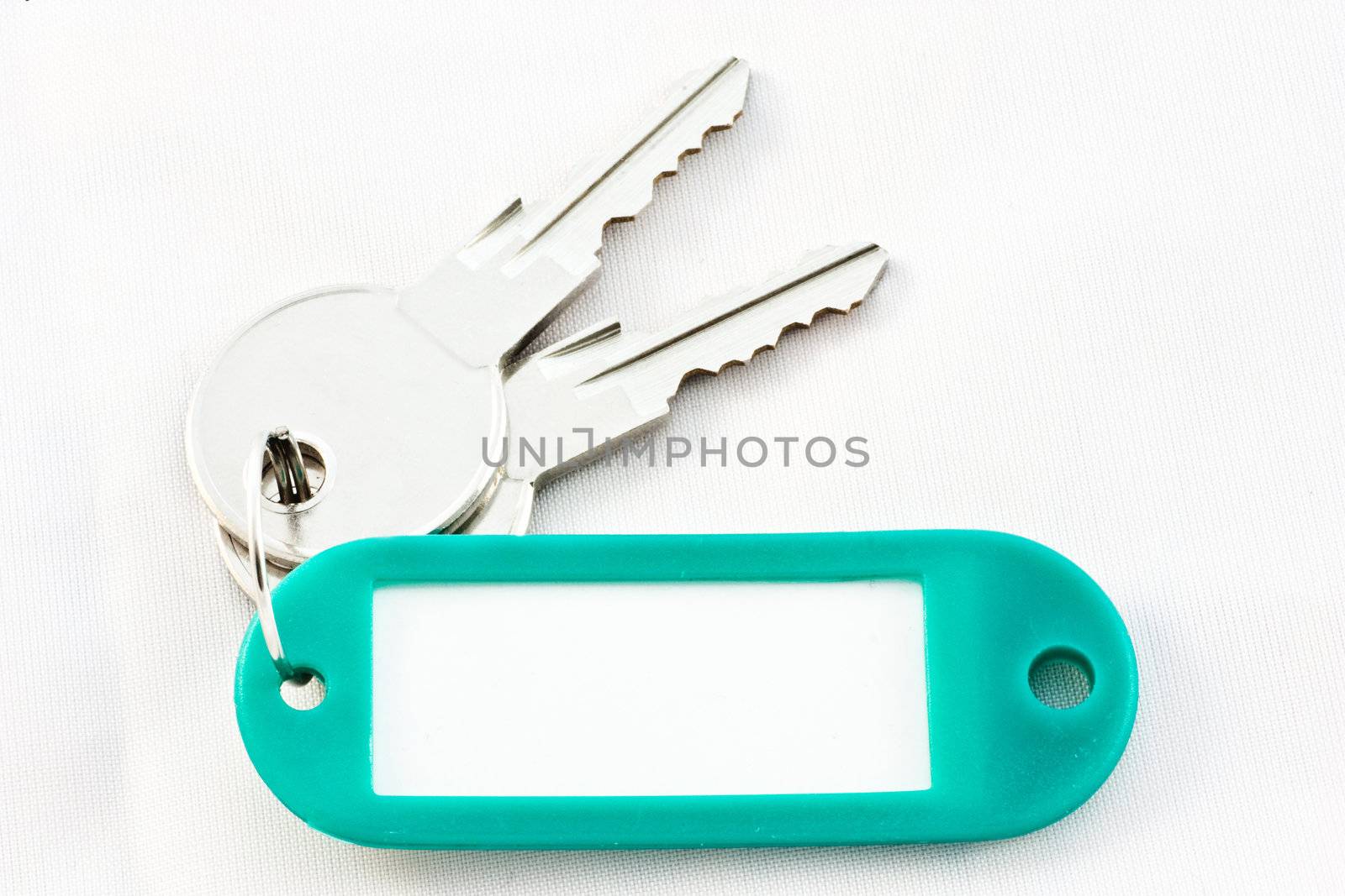 Bunch of keys with blank label isolated on white. Easy to add your own label