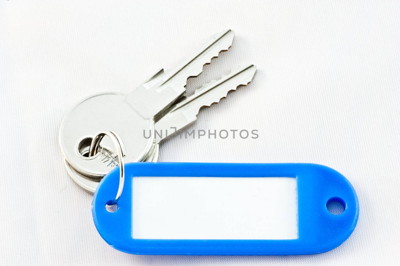 Bunch of keys with blank label isolated on white. Easy to add your own label