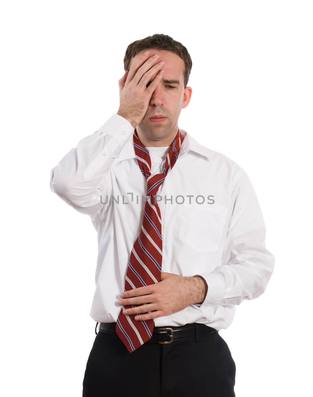 A young employee suffering from a stomach ache and a headache at the same time, isolated against a white background