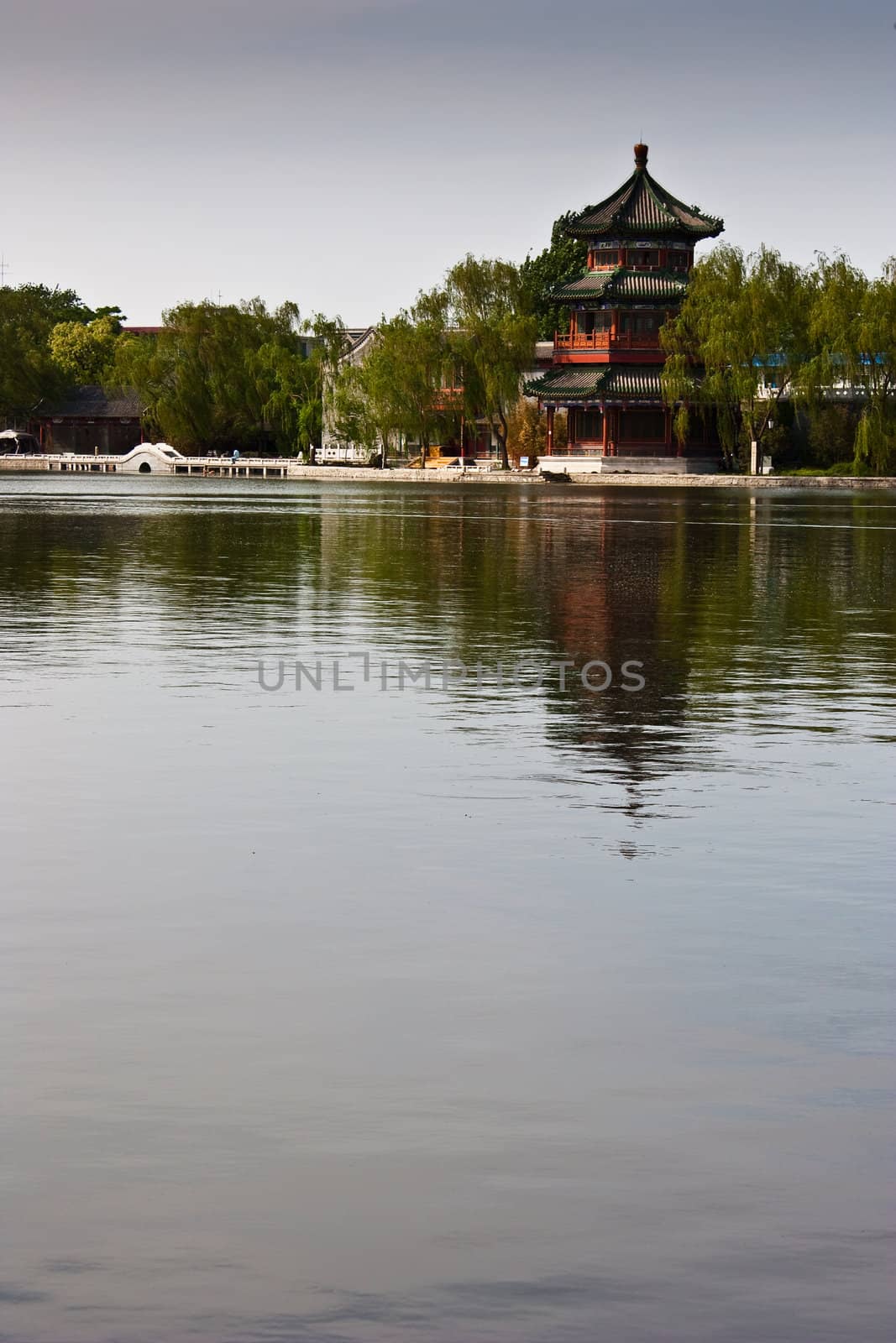 View of lake and ancient tower in Beijing, close to Forbidden City