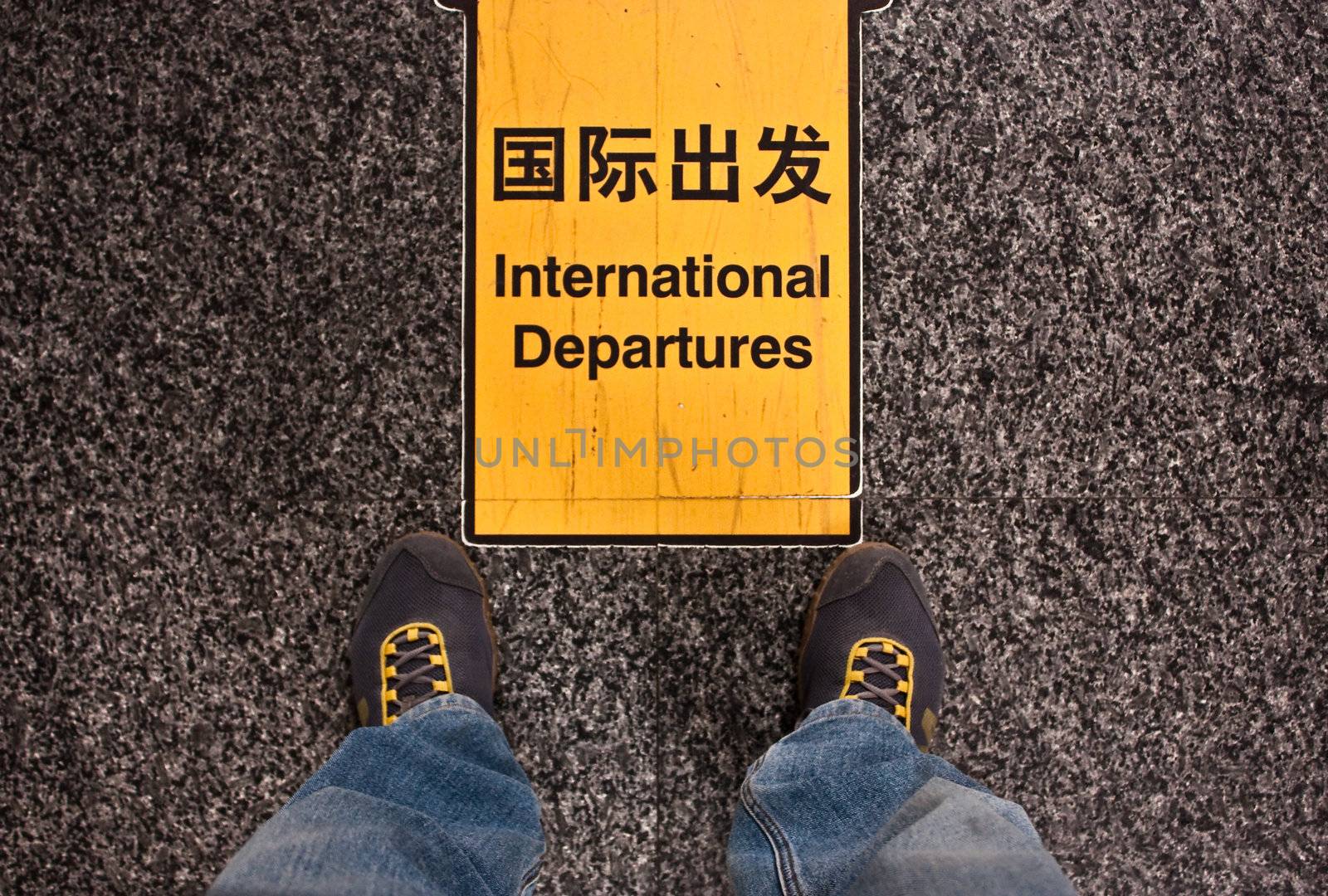Sign of international departures in a Chinese airport, good for conceptual