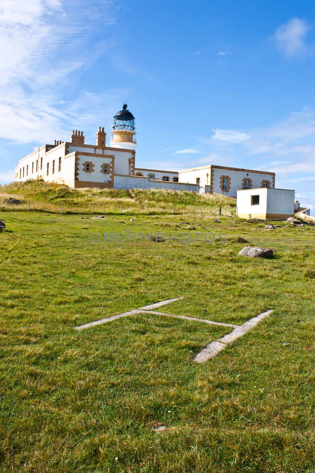 Helicopter platform close to lighthouse in Scotland
