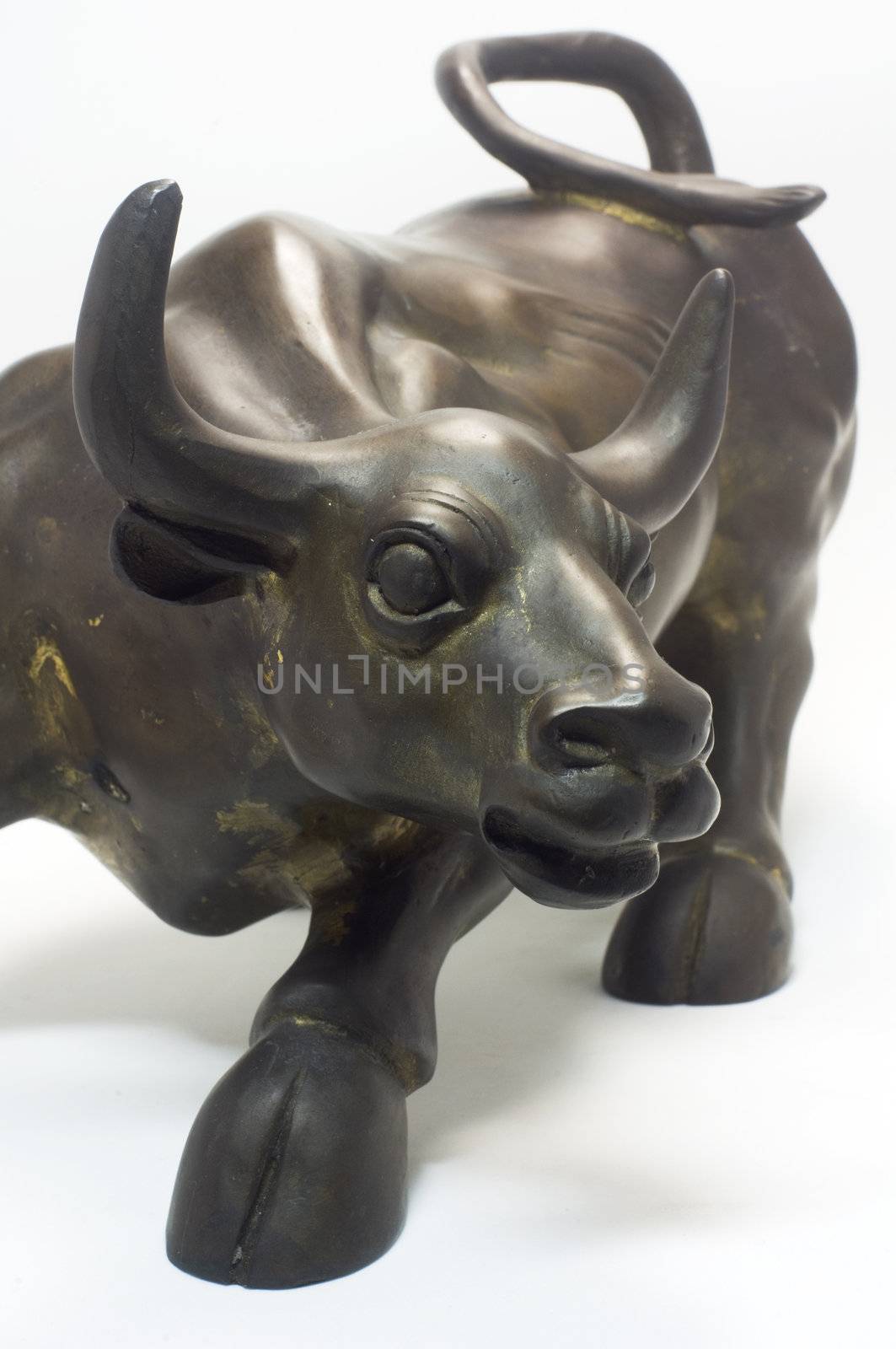 bull sculpture close up, metaphor of finance bull market.