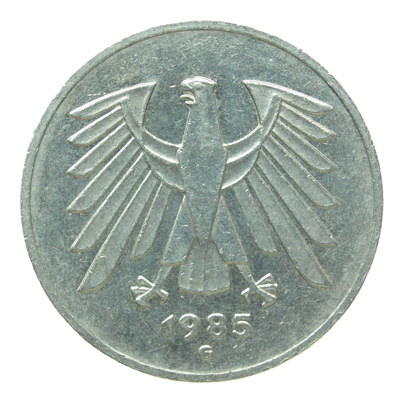 Vintage German coin isolated over a white background