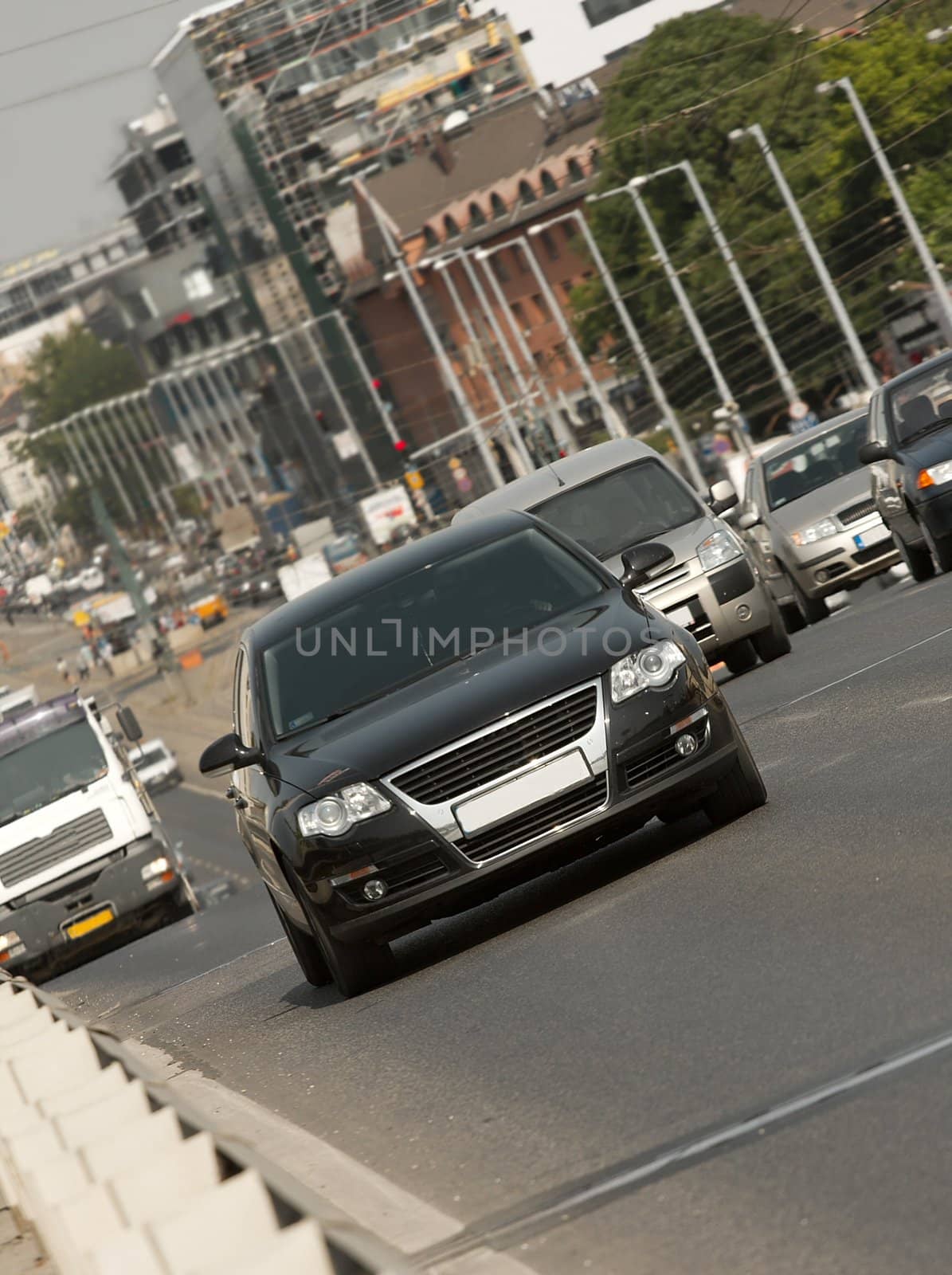 Cars passing by on an urban street