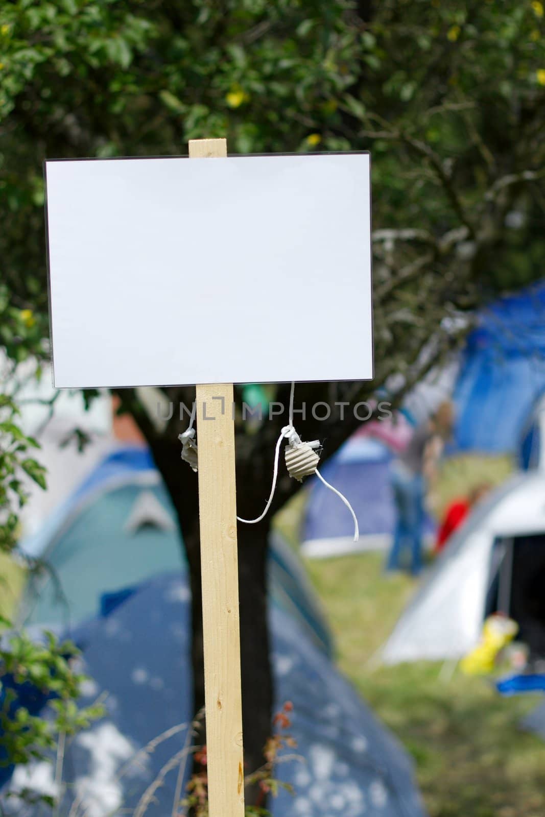 Blank signboard in front of a camping area