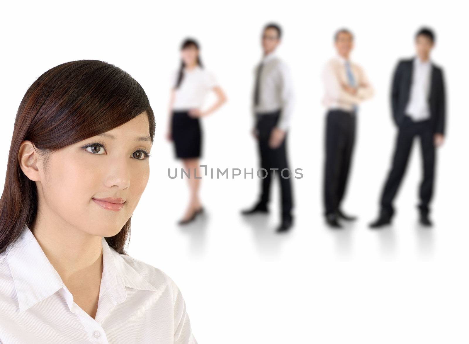Young business woman and her team over white background.