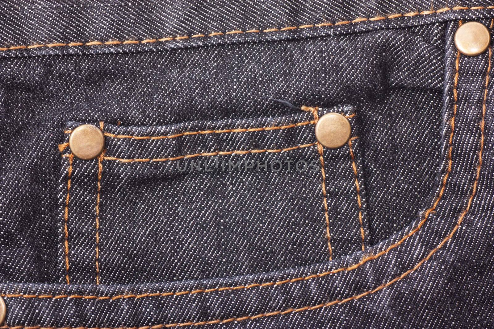 Closeup view of denim pocket.