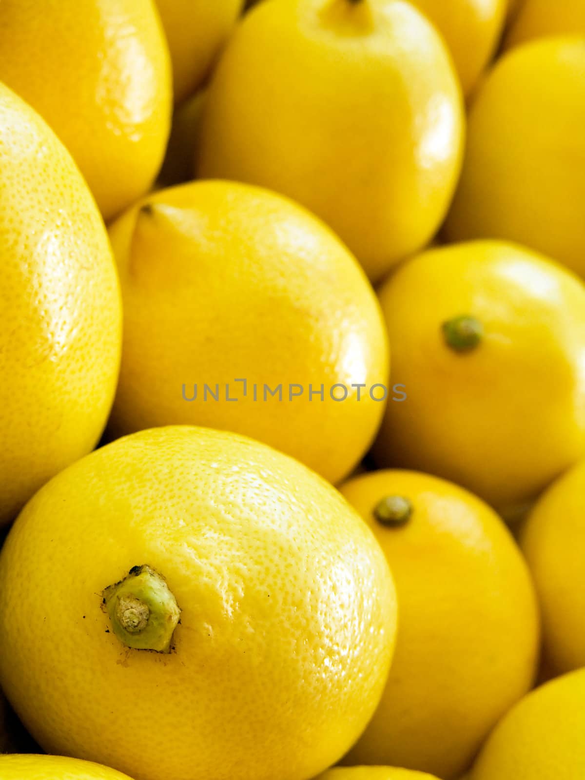 The beautiful yellow lemons on a counter