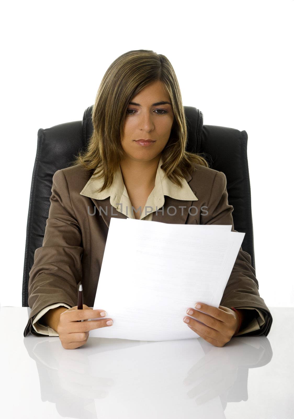Beautiful and happy business woman with a paper contract on is hands