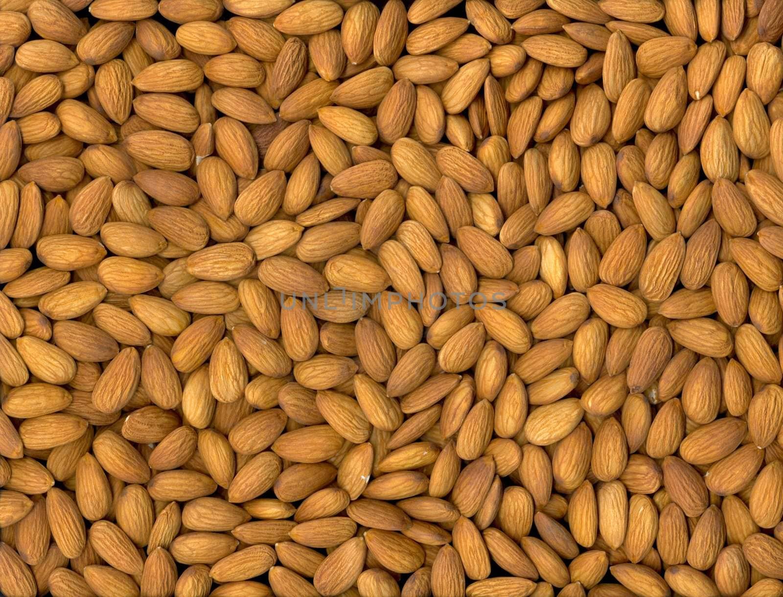Nothing but almonds - kinda nuts ;-) - compared to other almond photos, these are 'hand picked' with only a few damages. Use the photo as: � a poster, � part of a 'nutty wrapping or packing', � delicious decorations on kitchen equipments, � an exciting background for your own product e.g. lighten the photo all over or only partly with a transparent filter before adding your own text on top of it.