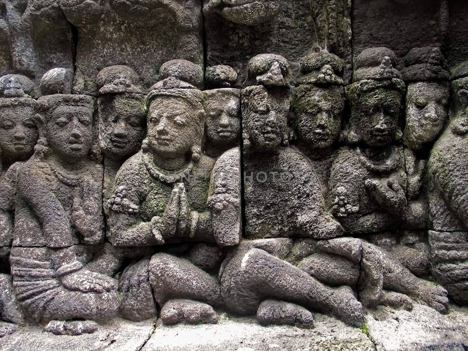 Sculptures in a wall of Borobudur temple, Yogyakarta, Java, Indonesia.