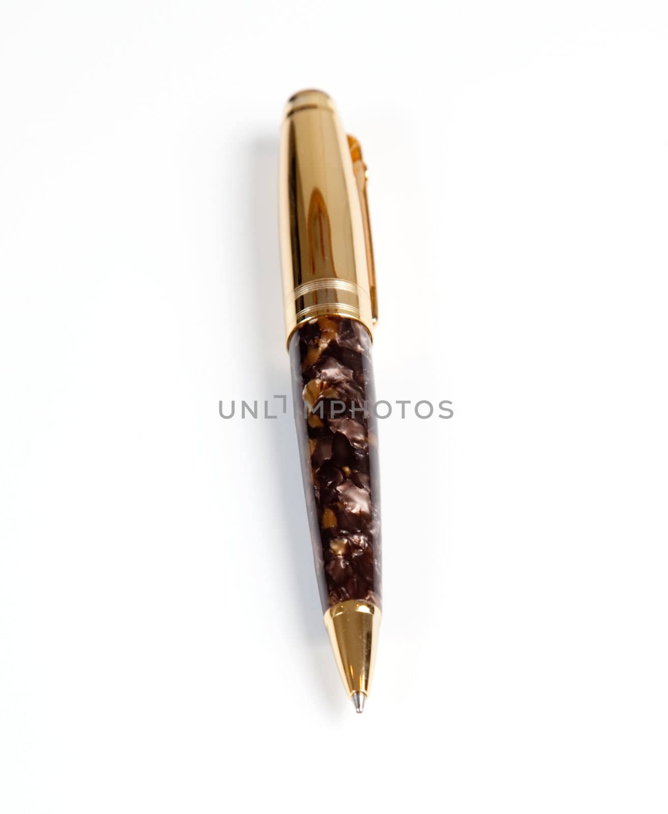 Ornate gold ball point pen isolated against white