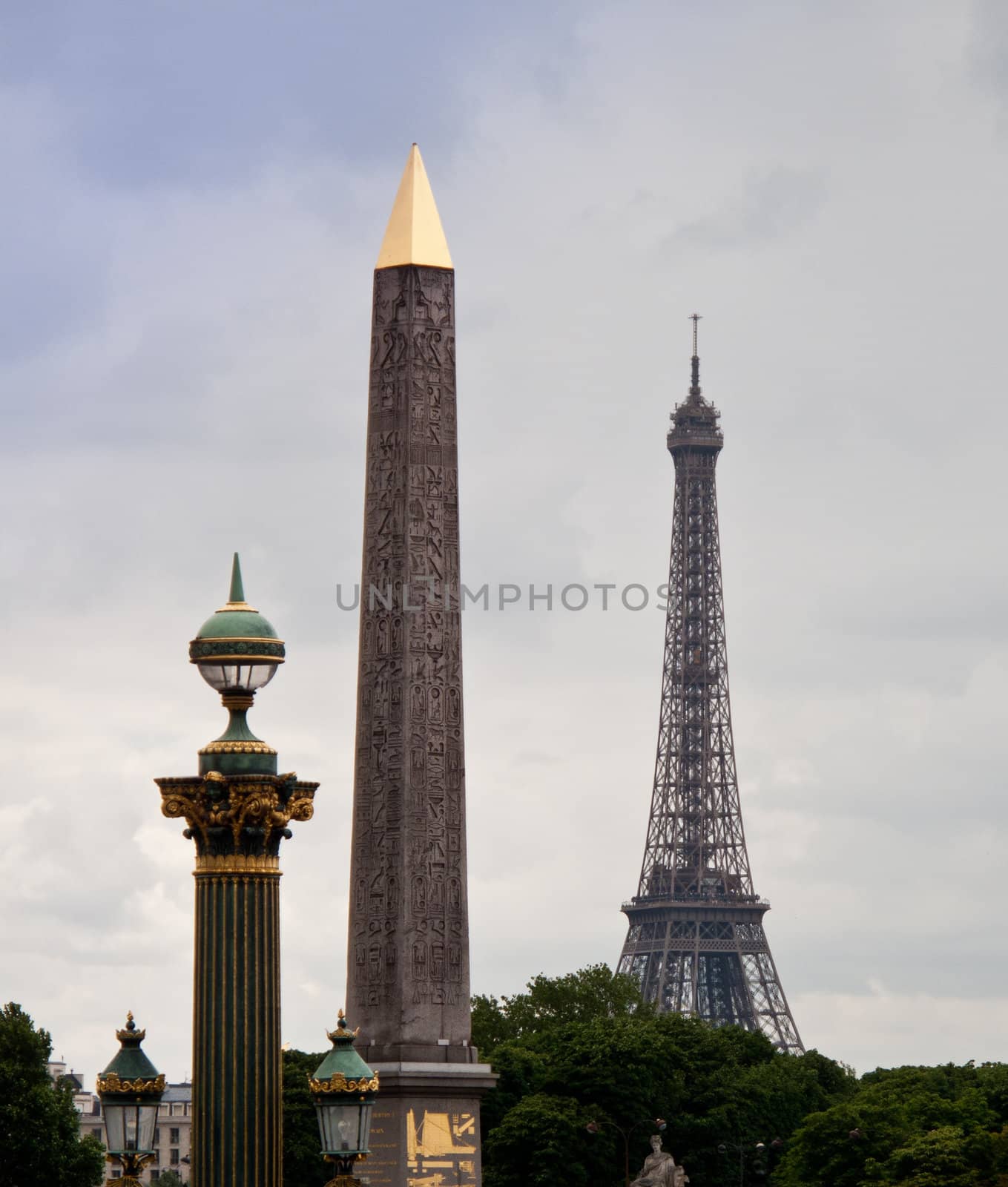 Paris cityscape with Cleopatra's needle obelisk and Eiffel Tower