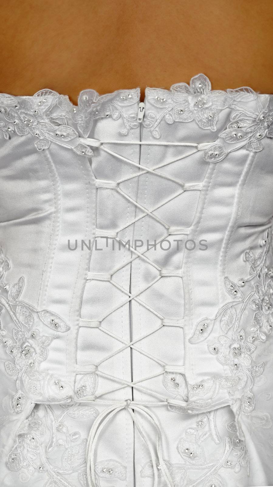 Corset of a white wedding dress - the rear view