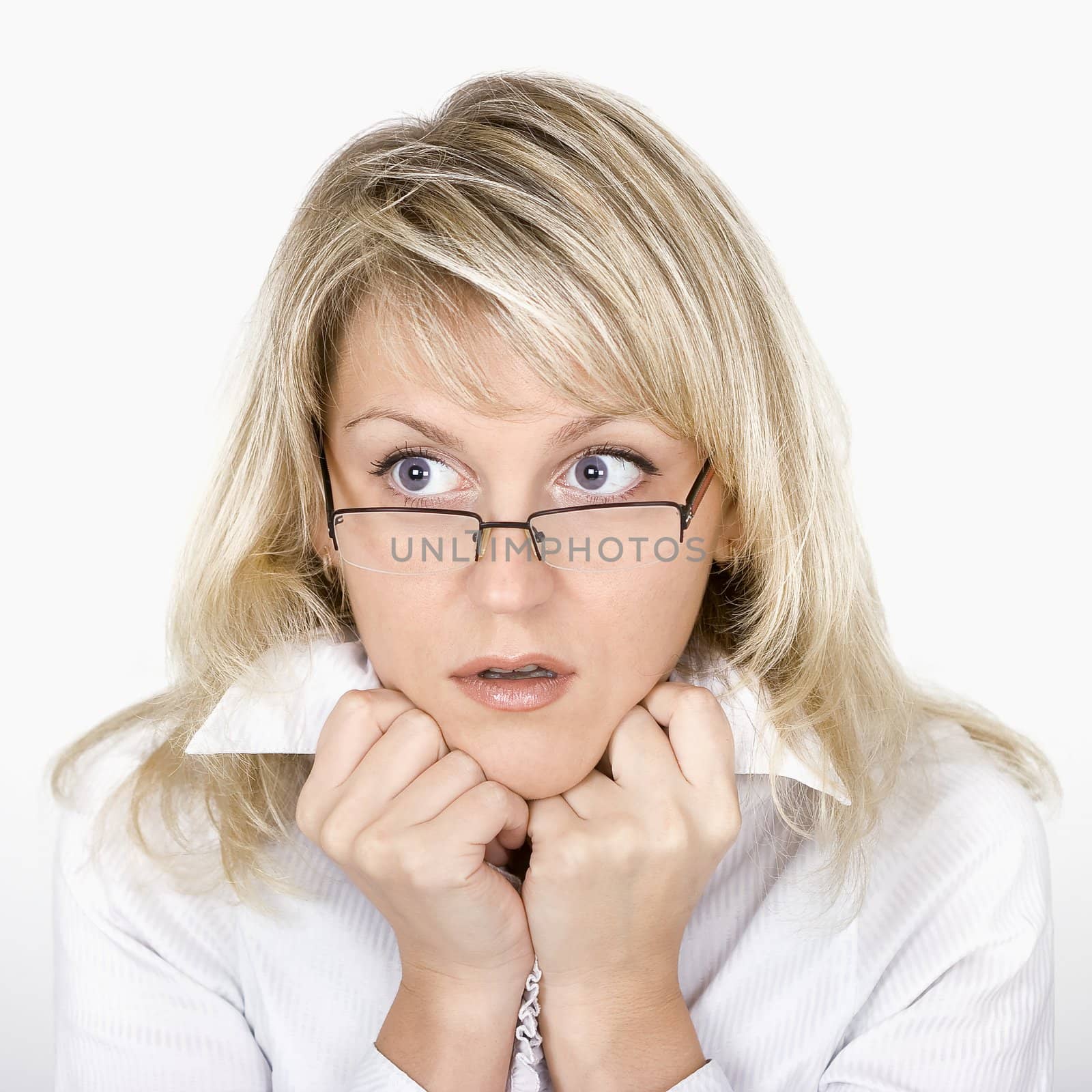 The uncombed scared business young woman in glasses
