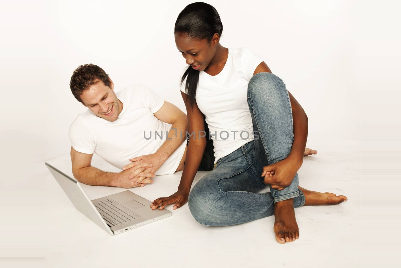 Couple shopping on internet paying online