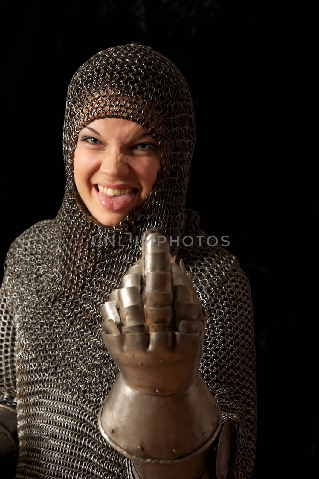 The girl in a medieval knightly armour