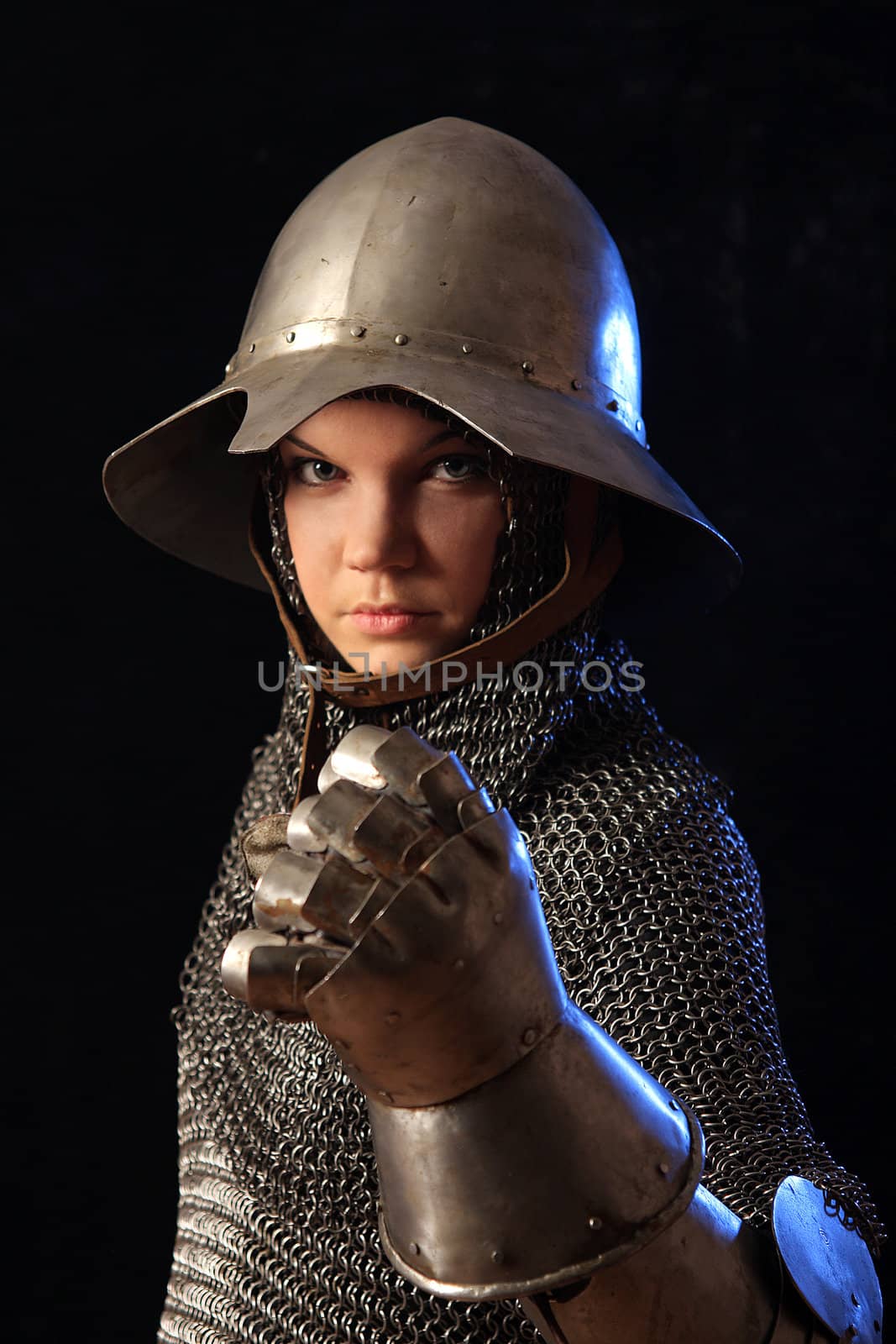 The girl in a medieval knightly armour