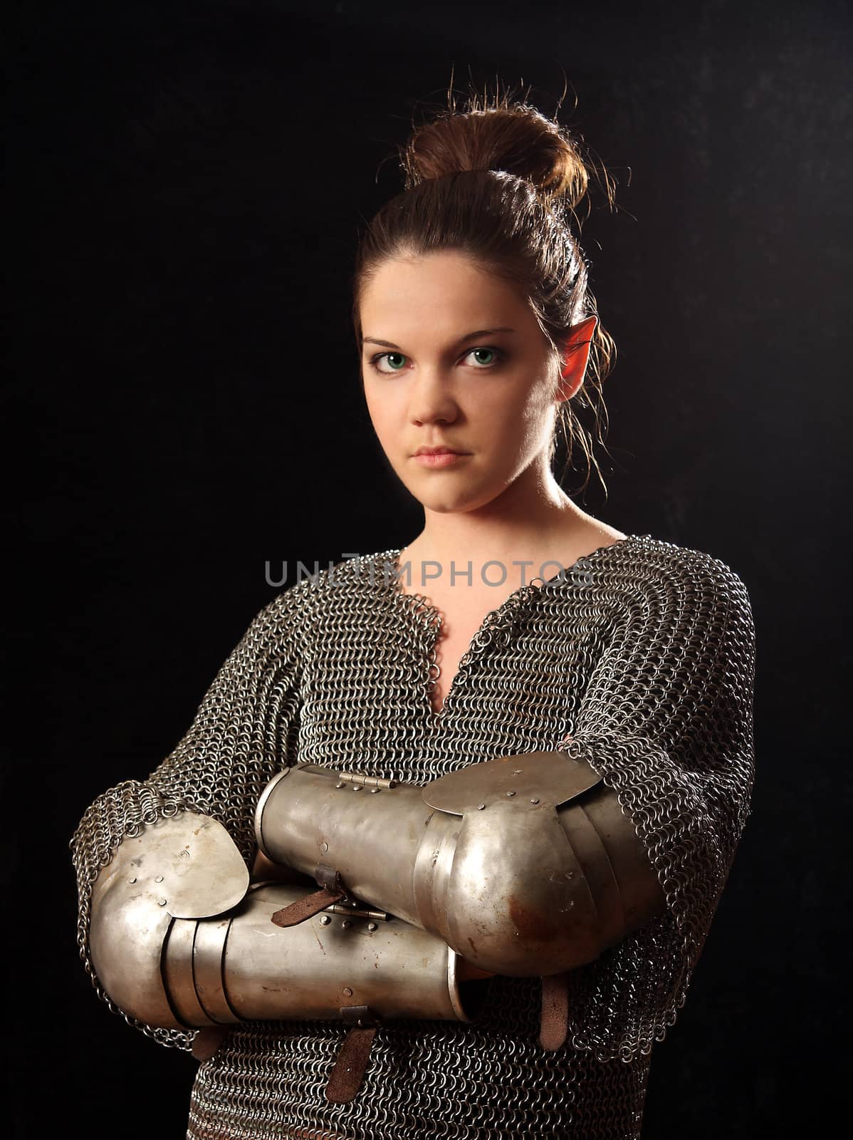 The girl in a medieval knightly armour