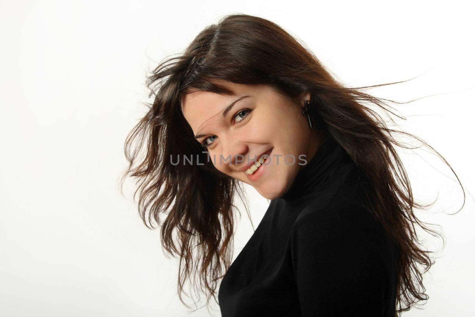 The beautiful, emotional girl on a white background